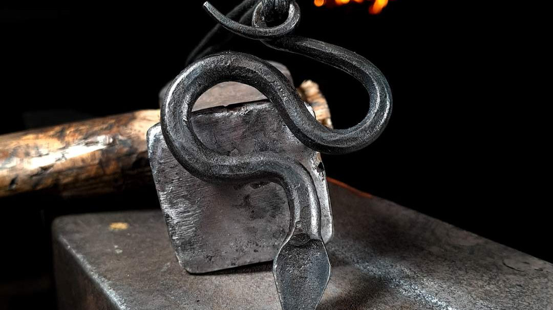 Serpent pendant inspired by Scandinavian folklore and Norse mythology