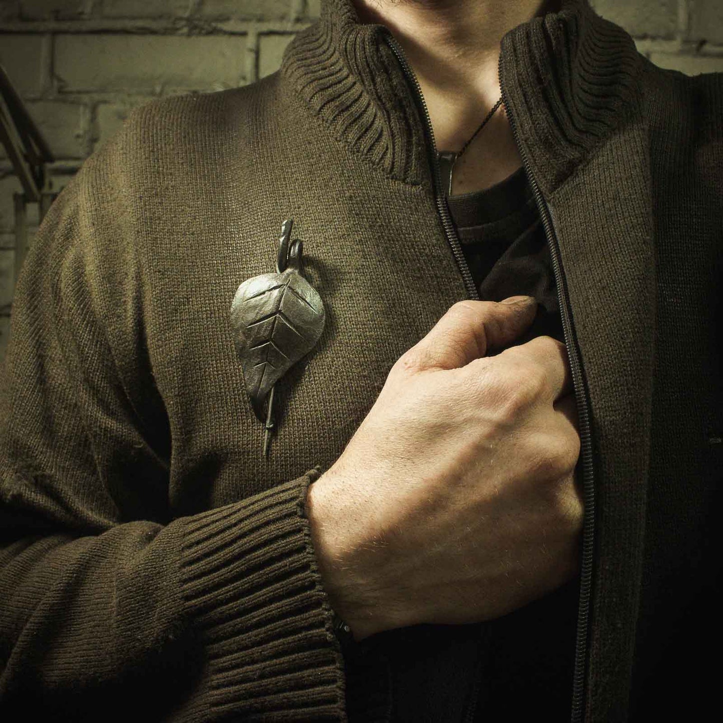 forged leaf brooch
