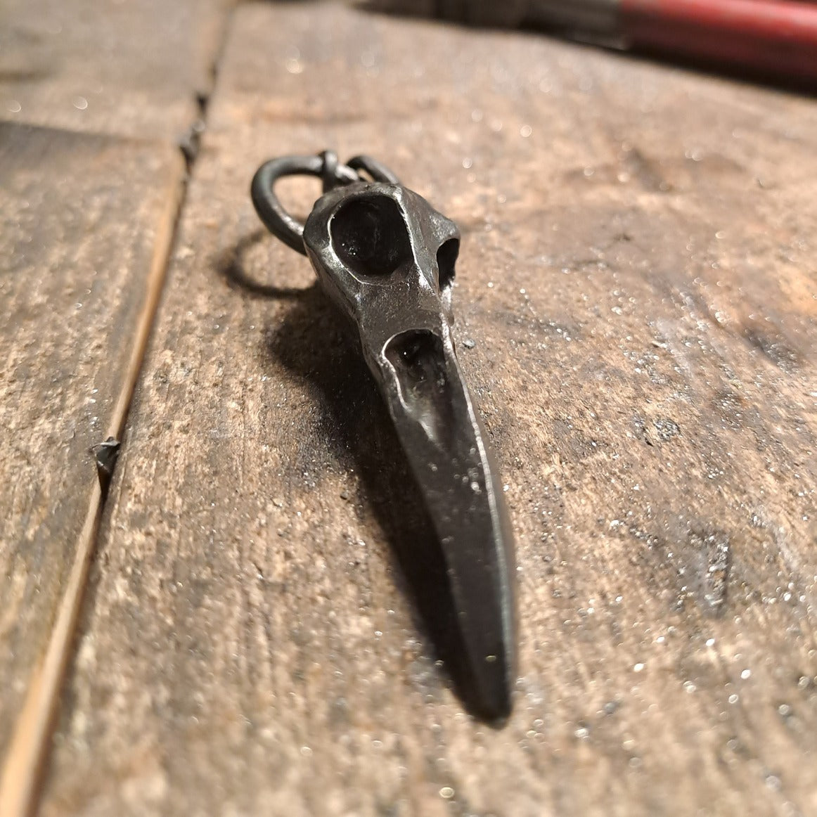forged raven skull from norse mythology