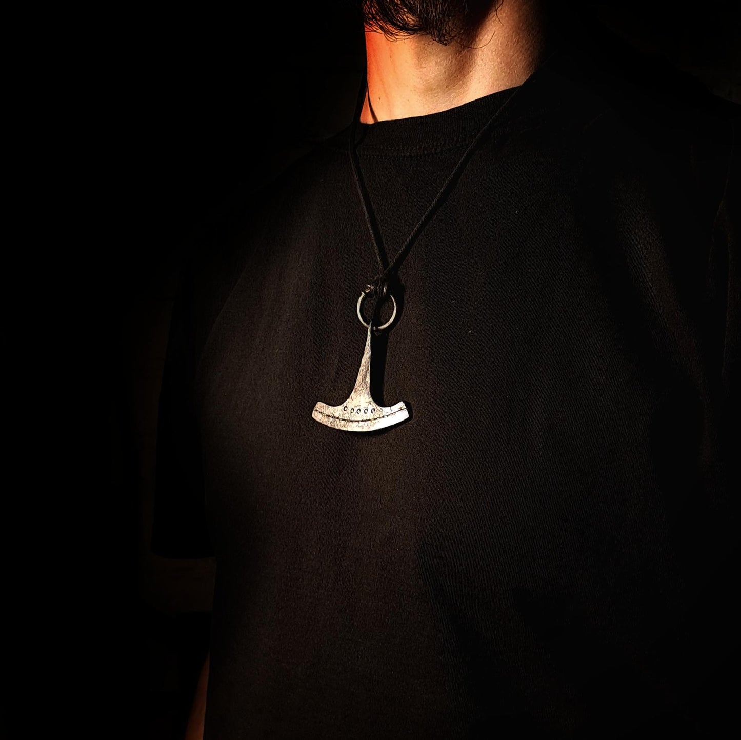 model wearing ukonvasara pendant