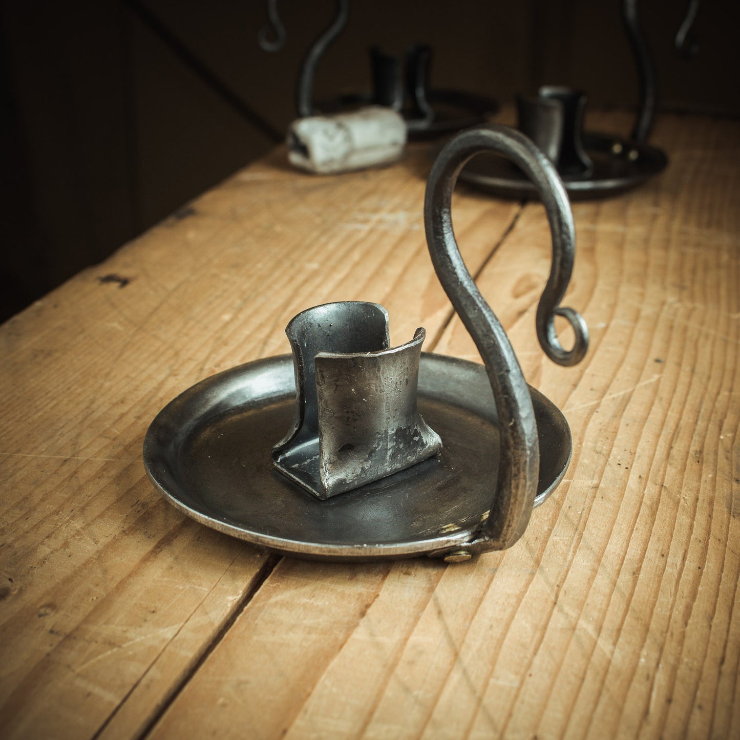 Forged iron candle holder