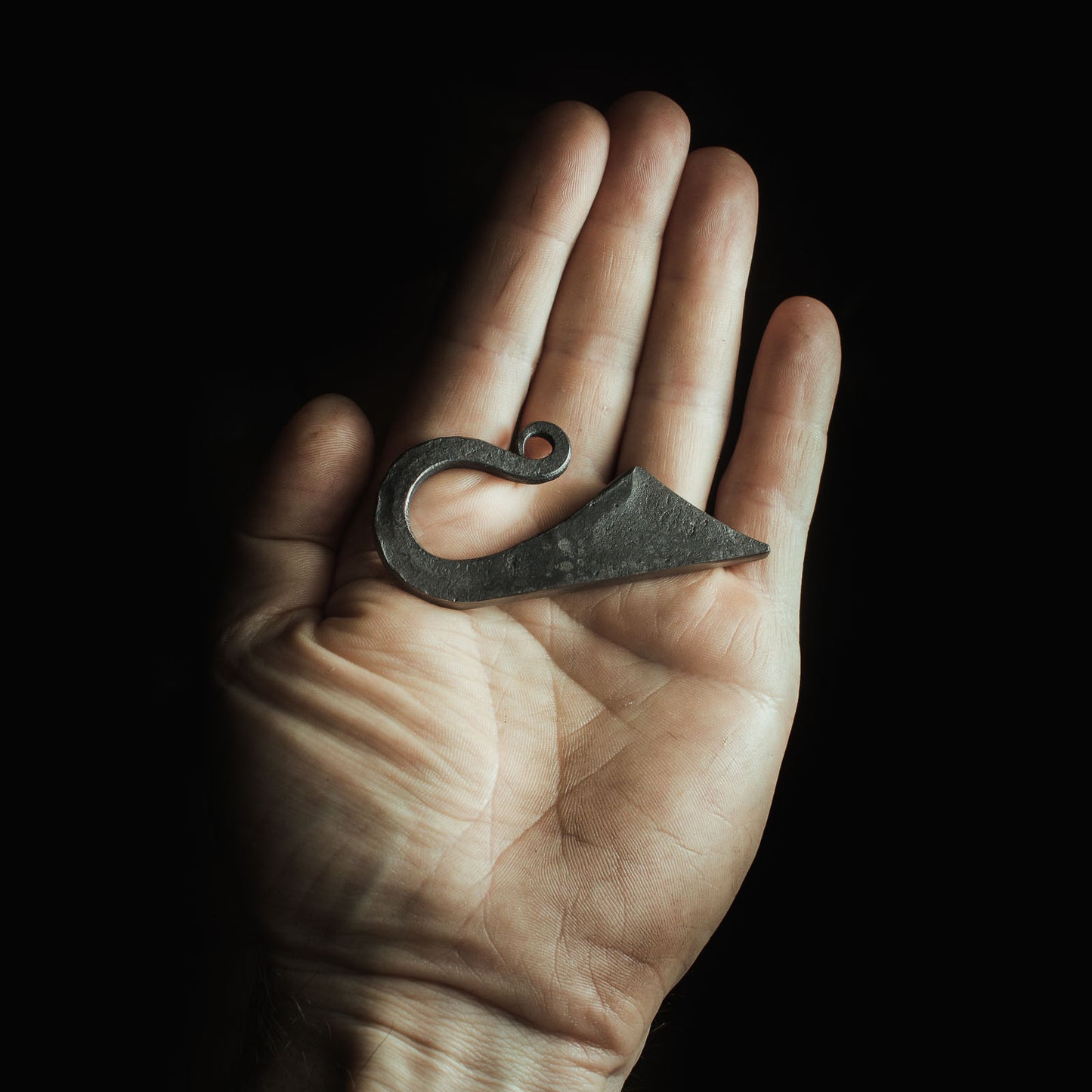Hand forged flint striker
