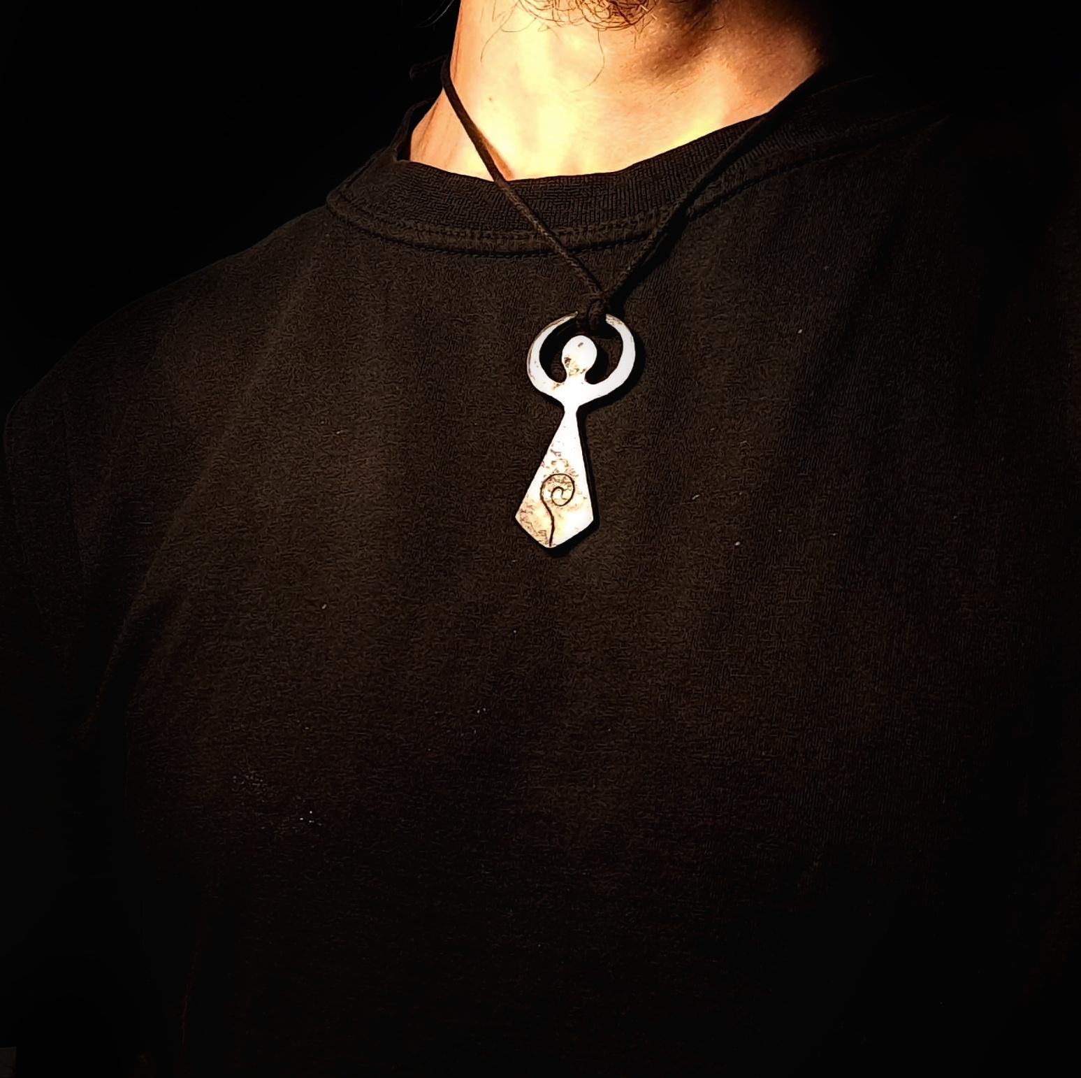 model wearing a moon goddess pendant
