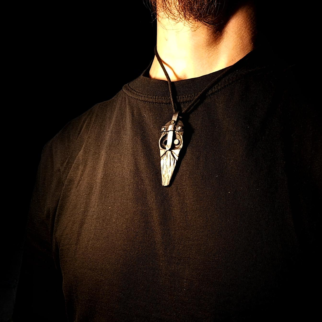 model wearing an odin pendant