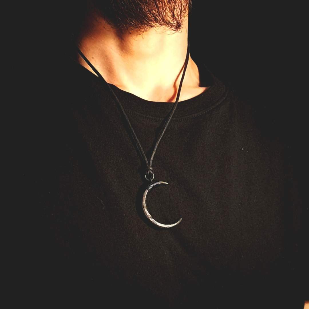 model with moon pendant
