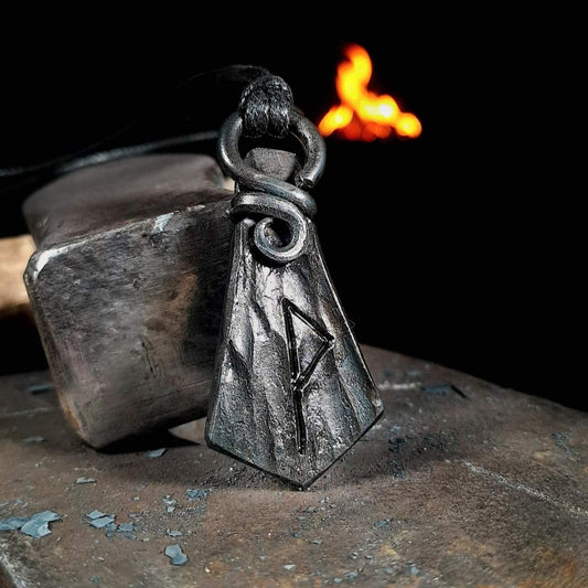 a hand-forged rune pendant