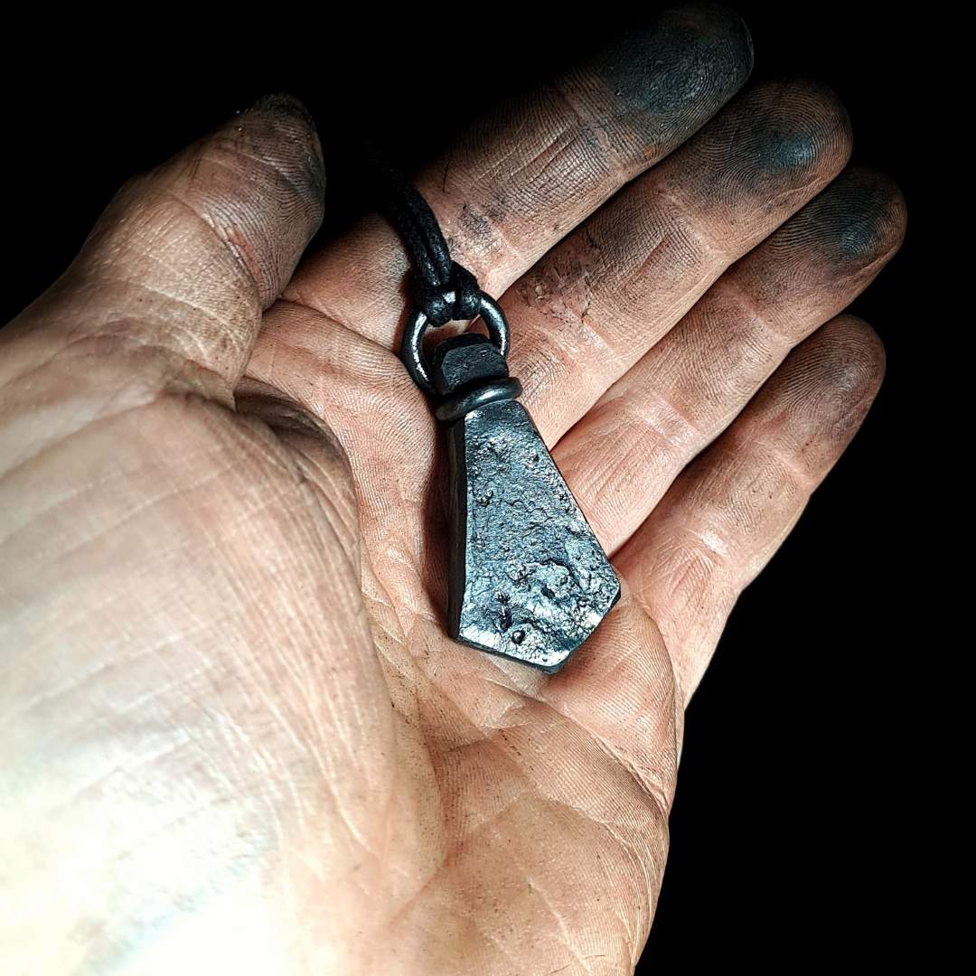backside of hand-forged rune pendant