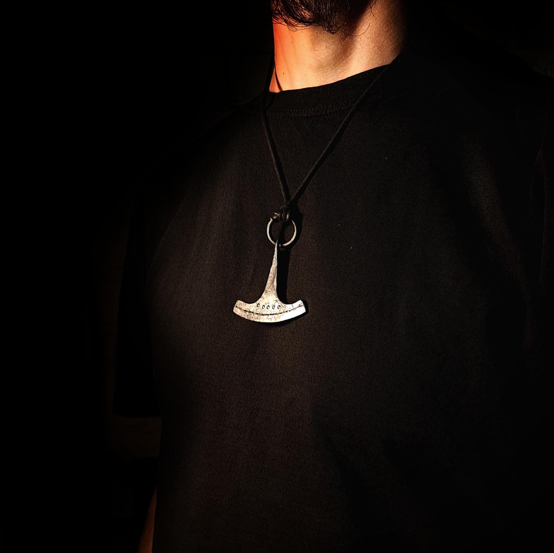 model wearing ukonvasara pendant