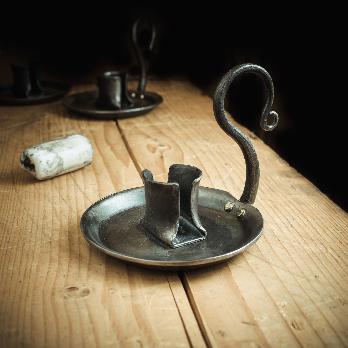 Forged iron candle holder