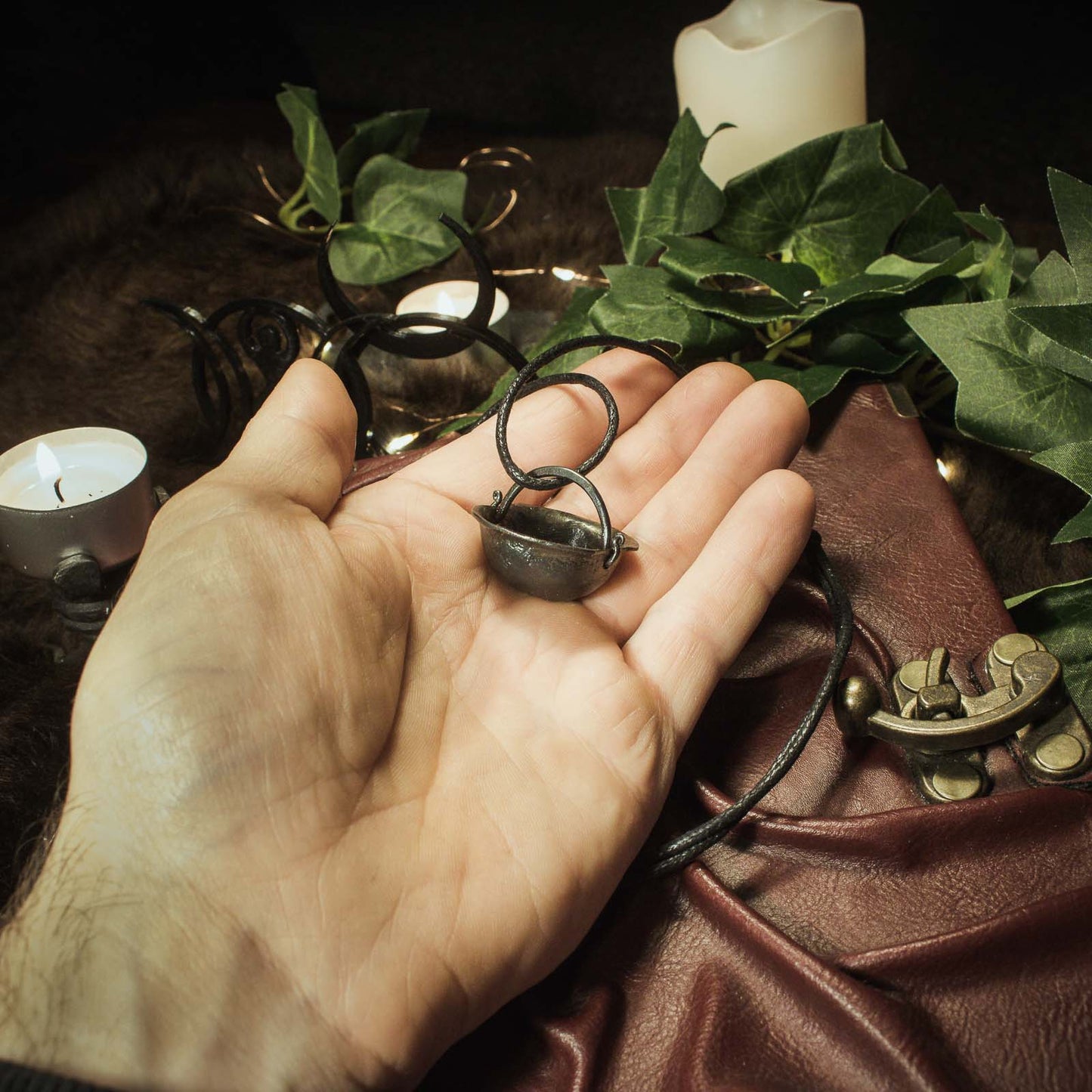 The Witches iron cauldron pendant
